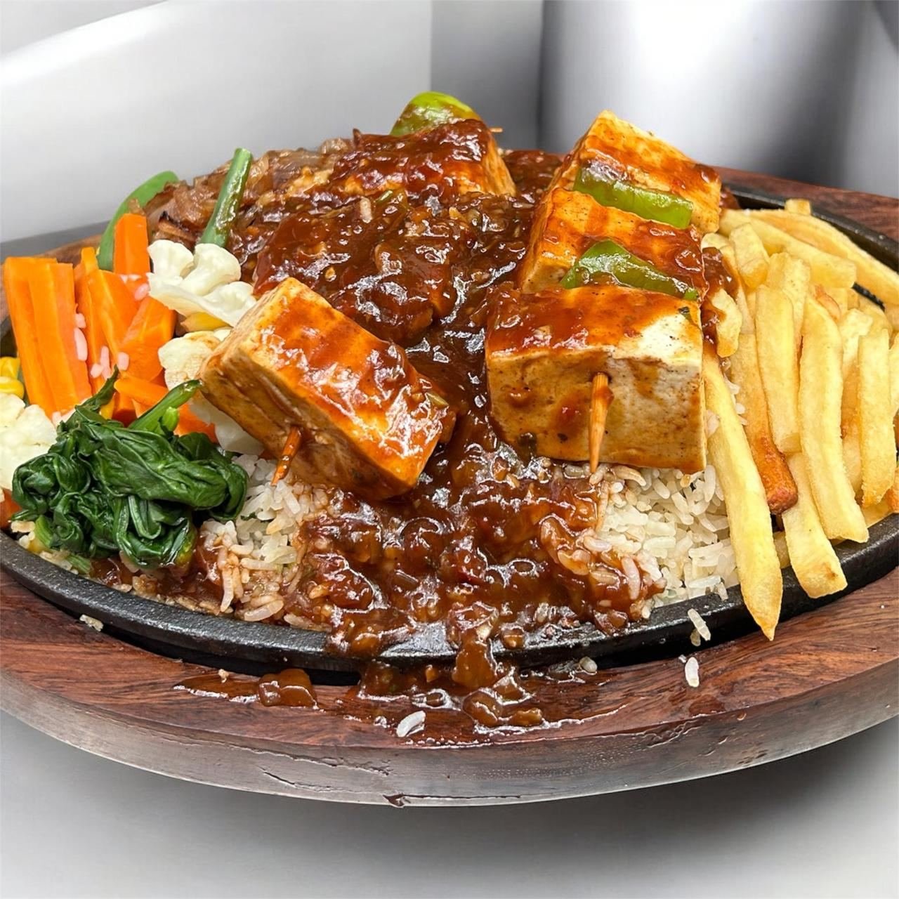 Paneer masala sizzler with fries